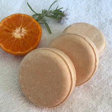 Load image into Gallery viewer, Orange and Rosemary Handmade Shampoo Bar with orange half 
